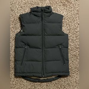 Kid’s size S puffy vest. Grey-green with camo lining.